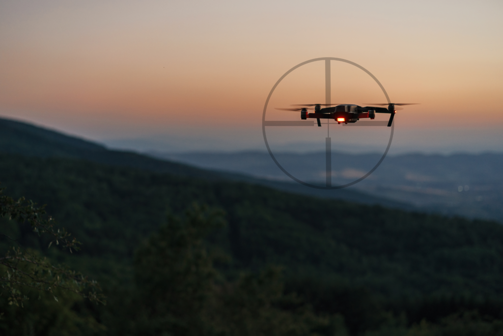 A drone flying in the air with crosshairs overlaid on the view